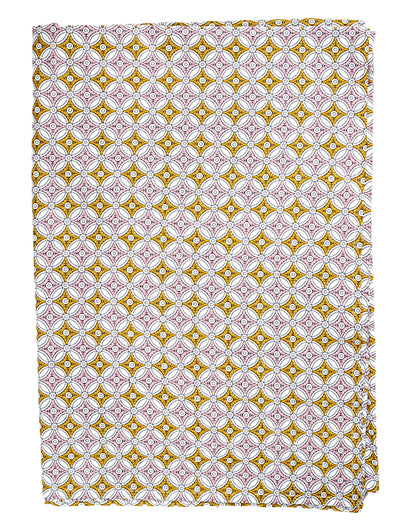 Patterned fabric with a geometric design in yellow, pink, and white on a white background